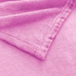 Durable double-stitched edges and soft ring-spun fleece texture of a Pink throw blanket