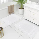 White Luxury Bathroom Rugs placed in a modern vanity guest room