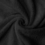 Black luxury bath towel highlighting the dense, absorbent ring-spun cotton loops and industrial-grade fiber quality