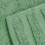High-density green face towel crafted with premium material loft to upscale Canadian spa and hospitality facilities