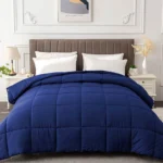 Navy blue comforter featuring a wrinkle-resistant baffle box construction for efficient housekeeping