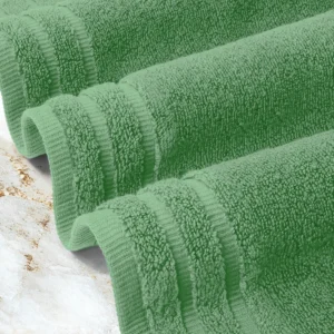 Green Face Towel with dense weaving required for frequent industrial laundering