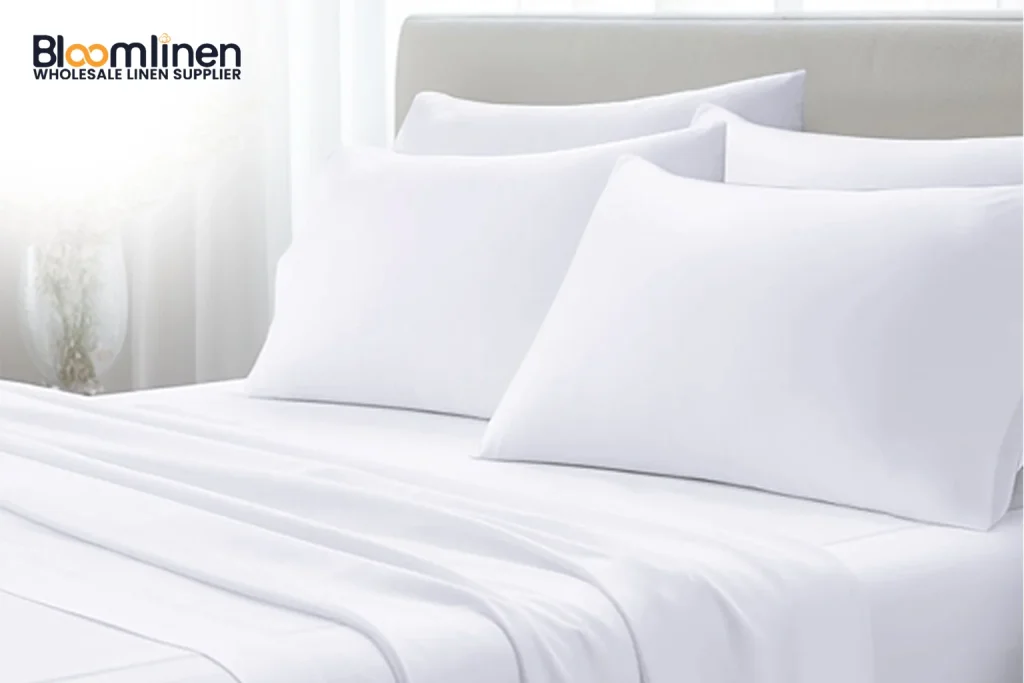 Hotel pillow comparison showing hollowfiber, down alternative, and microfiber options